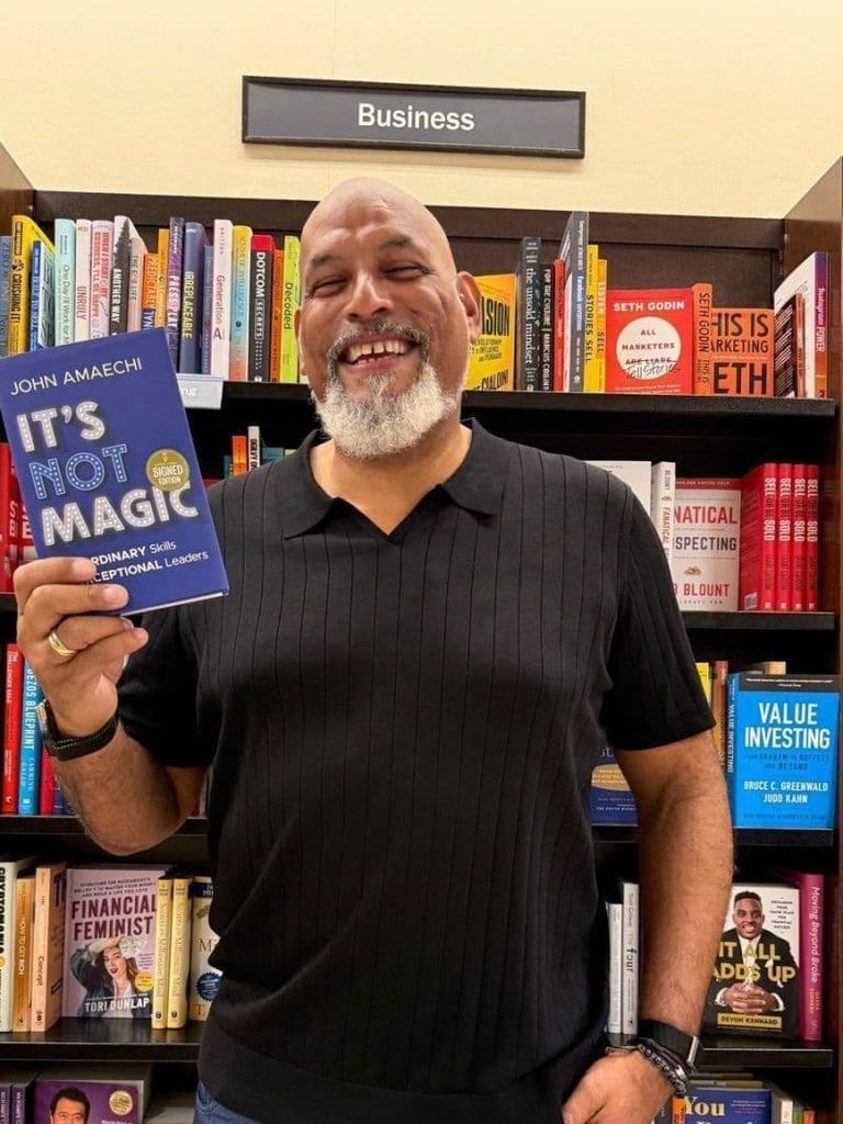 John Amaechi signing the first copies of It’s Not Magic to arrive at Barnes & Noble in New York (September 2025)
